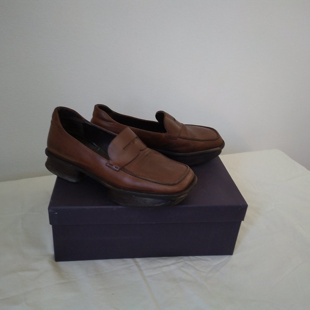Tan Prada platform loafers